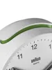 Close-up of a white analog alarm clock face with a green accent. Náhľad obrázku produktu