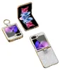 Three different views of a glittery phone case for a Samsung Galaxy Z Flip phone, displayed on a white background. Produktbild-Vorschau