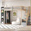 A child's loft bed with integrated storage and stairs, set in a bedroom. Produktbild-Vorschau