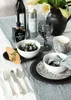 A table setting with food, drinks, and tableware. Produktbild-Vorschau