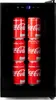 Six cans of Coca-Cola stacked in a mini-refrigerator. Voir les images du produit