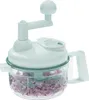 A white manual food chopper filled with chopped red onions, set against a white background. Náhľad obrázku produktu