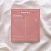 A pink package of Biodance Bio-Collagen Real Deep Mask is laid on a white, textured fabric. Náhľad obrázku produktu