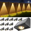 A collage showing solar fence lights installed on a wooden fence at night, and a separate group of the lights. Produktbild-Vorschau