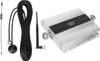 A cell phone signal extender amplifier and its accessories are laid out on a white background. Náhled obrázku produktu
