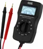A black multi-function battery tester with red and black test leads is shown against a white background. Voir les images du produit