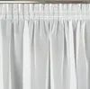 A close-up view of white sheer curtains hanging from a curtain rod. Náhľad obrázku produktu