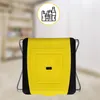 A yellow and black trash bag stand with a recycling symbol on the front, set against a blurred background of shelves. Anteprima dell’immagine prodotto