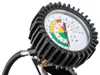 A close-up shot of a tire pressure gauge with a black ribbed casing and a white dial face. Anteprima dell’immagine prodotto