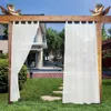 Outdoor pergola with white sheer curtains, overlooking a backyard with a swimming pool and a house. Voir les images du produit