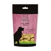 A bag of dog treats with a silhouette of a dog and grass. Produktbild-Vorschau