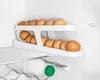 An egg holder with eggs inside a refrigerator. Náhled obrázku produktu