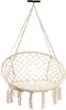 A beige macrame hanging chair with fringes, suspended from a black hook against a white background. Podgląd zdjęcia produktu
