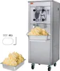 A commercial ice cream maker with a tray of ice cream in front of it and some accessories to the side. Voir les images du produit