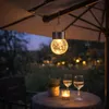 DOCHTMANN Lot de 4 lanternes solaires transparentes de 9 cm Voir les images du produit 5