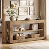 A console table with decorative items and books on display. Produktbild-Vorschau