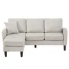 A light beige sectional sofa with a chaise lounge and a single throw pillow, shown against a white background. Anteprima dell’immagine prodotto