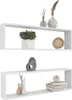 Two white cube shelves are displayed against a white background, each with decorative items. Náhľad obrázku produktu