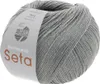 A ball of grey yarn with a label. Produktbild-Vorschau