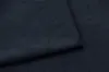 A close-up view of a dark blue fabric, likely upholstery for a sofa, with a fold creating a shadow. Náhled obrázku produktu