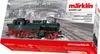 A model train box with a picture of a steam locomotive on it. Produktbild-Vorschau