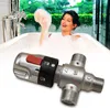 A woman is taking a bubble bath while a thermostatic mixing valve is shown in the foreground. Podgląd zdjęcia produktu