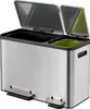 A stainless steel dual-compartment recycling bin with two foot pedals and open lids. Voir les images du produit