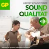 An elderly man plays guitar while a young boy plays cymbals, both smiling. Náhled obrázku produktu