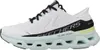 A side view of a white Skechers athletic shoe with black and mint green accents. Voir les images du produit