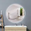 A modern bathroom with a round LED mirror reflecting a bathtub and an outdoor view. Produktbild-Vorschau