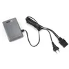 A gray foot control pedal with a black cord and two plugs is shown on a white background. Náhľad obrázku produktu