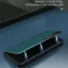 A teal flip case for a smartphone is shown partially open, revealing the phone's screen with stylized lightning graphics. The background is a dark blue surface with a black laptop or similar object in the upper portion. Produktbild-Vorschau