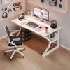 A modern white computer desk setup with a gaming chair, computer, monitor, and accessories. Produktbild-Vorschau