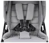 Close-up of a gray stroller seat with a five-point harness. Produktbild-Vorschau