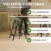 A man is working with a sawhorse in a workshop or construction site. Produktbild-Vorschau