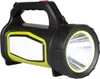 A black and yellow flashlight with a white label area, set against a white background. Podgląd zdjęcia produktu