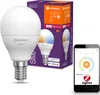 A smart LED light bulb and its packaging are displayed alongside a smartphone showing a control app. Náhled obrázku produktu