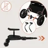 An illustration showing how to attach a buggy board to a stroller, with a close-up of the board and its components. Náhľad obrázku produktu