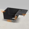 A black granite kitchen sink with dimensions indicated by text overlays. Produktbild-Vorschau