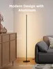 A modern living room setting with a floor lamp, a cabinet, and a sofa. Podgląd zdjęcia produktu