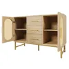 A light wood sideboard with rattan accents and gold metal legs, shown with its doors open. Podgląd zdjęcia produktu