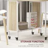 Close-up view of the storage area under a table, showing storage boxes and a basket. Produktbild-Vorschau