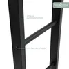 Close-up view of a black metal frame, likely part of a firewood rack, showing details of its construction and finish. Produktbild-Vorschau