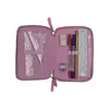 An open pink pencil case with stationery inside. Produktbild-Vorschau