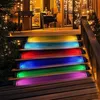A set of outdoor stair lights with colorful LED illumination. Produktbild-Vorschau