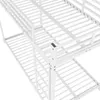 A close-up, angled view of a white metal bunk bed frame, showing the slatted surfaces of both the top and bottom bunks. Anteprima dell’immagine prodotto