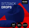A navy blue beanbag chair and a matching cushion are shown against a blue and red geometric background. Produktbild-Vorschau