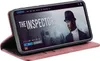 A smartphone in a pink flip case is displayed on a surface, showing a movie streaming interface on its screen. Produktbild-Vorschau