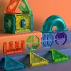 A collection of colorful magnetic building blocks arranged on a multi-level surface. Náhľad obrázku produktu