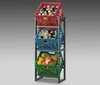 A three-tiered rack holding drinks and fruit. Produktbild-Vorschau